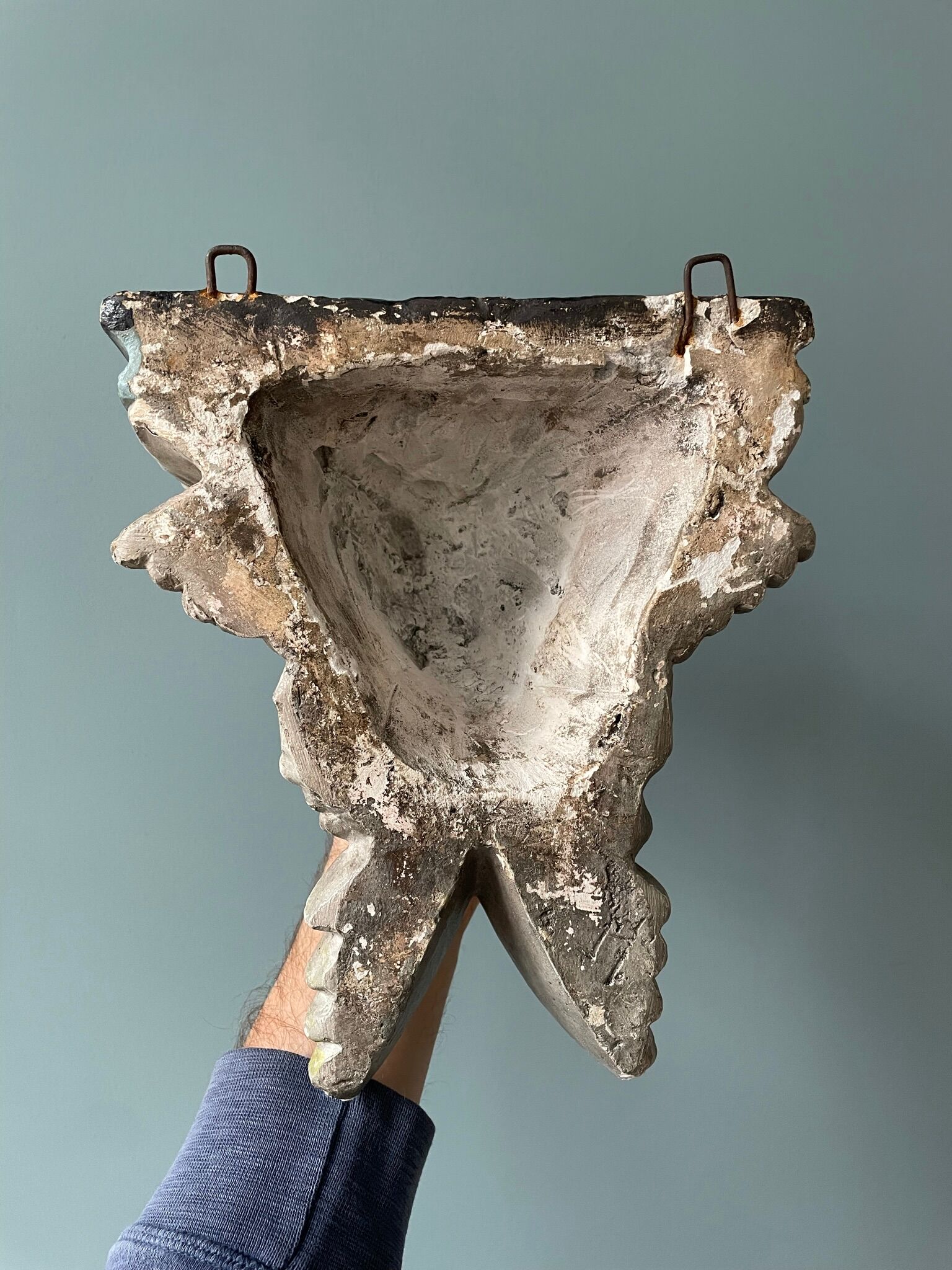 Nineteenth century plaster wall console, cherub decoration