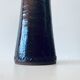 Tubular vase in glazed brown sandstone