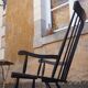 Rocking-chair vintage 50s in black lacquered wood