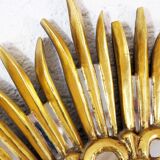 Sun mirror in wood and gilded stucco