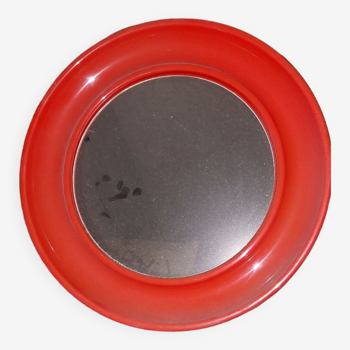 Orange round plastic mirror year 70