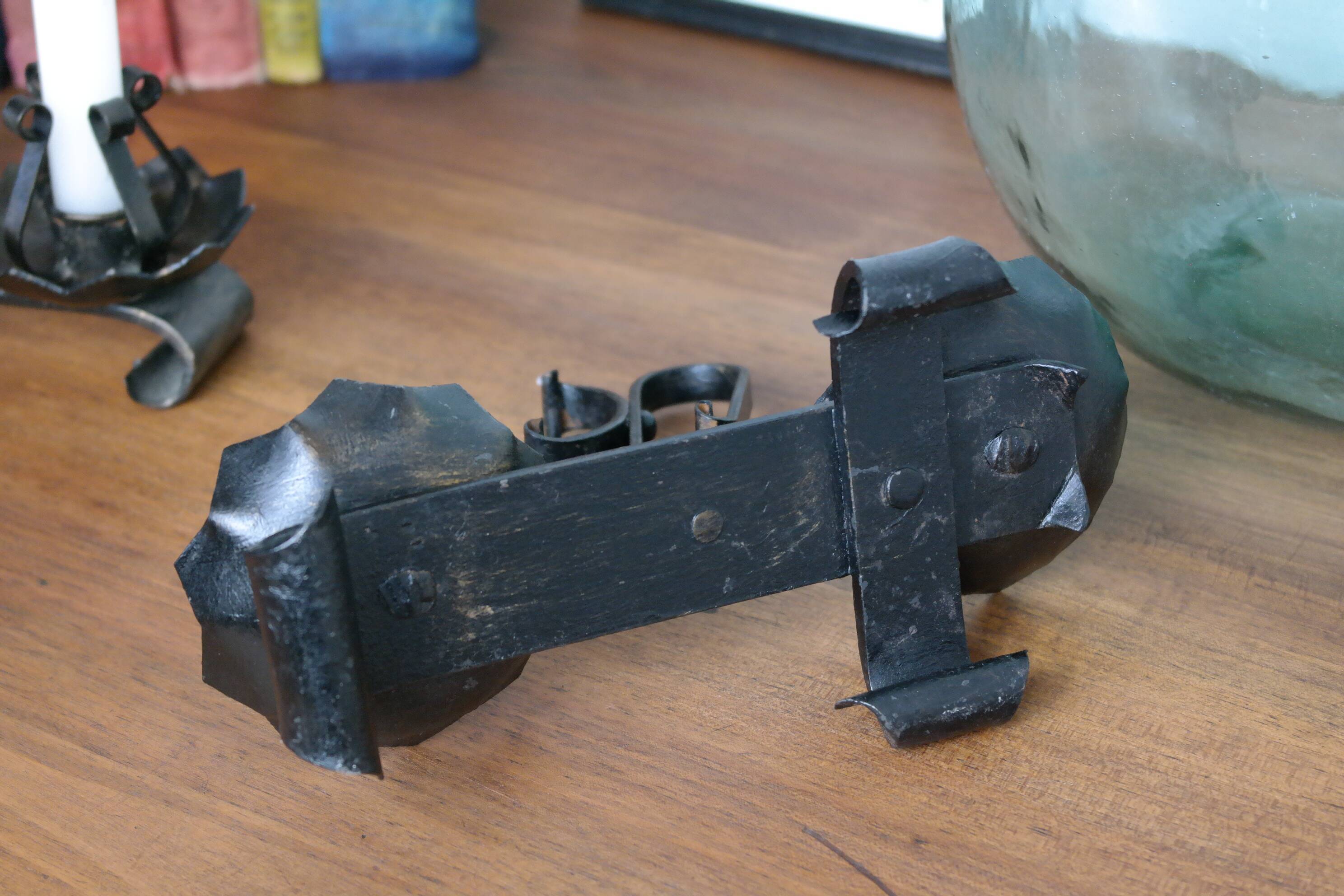 Old turned wrought iron candlesticks