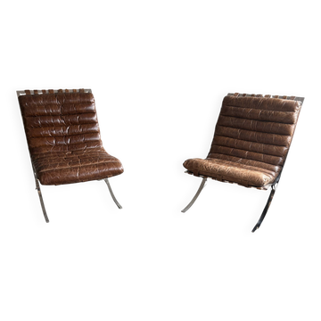 Pair of brown leather armchairs