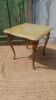 Vintage side table in gilded brass with an onyx top.