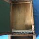 Ancient doll cabinet
