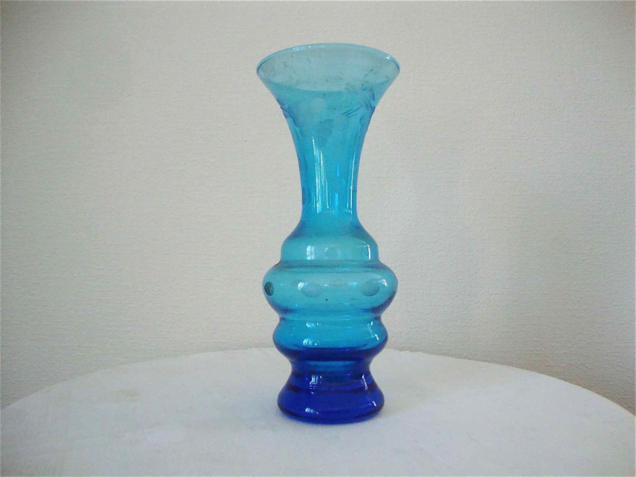 Ancient vase in engraved glass