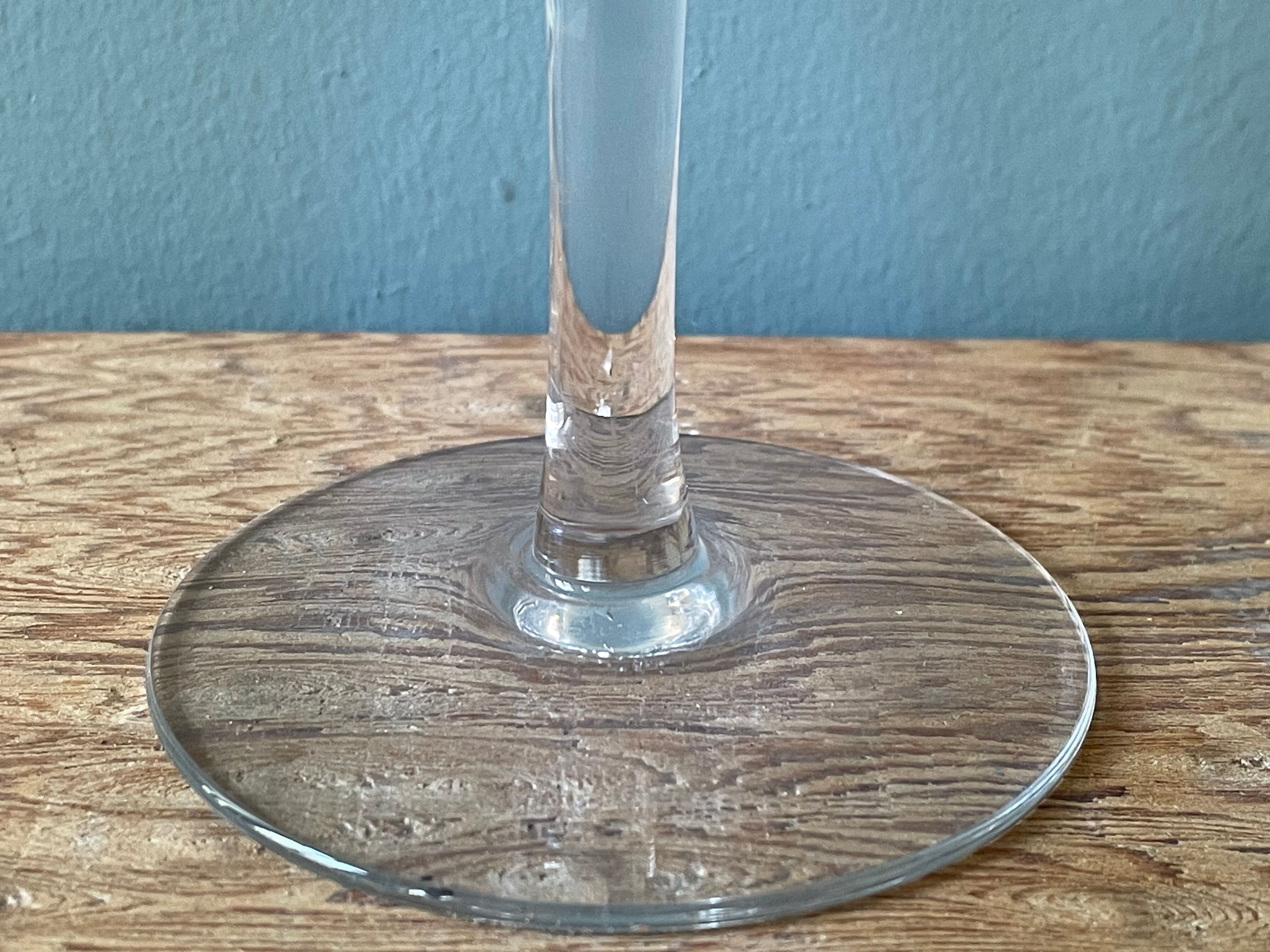 Set of 4 antique chiseled crystal foot glasses