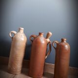 Trio of sandstone carafes with cove