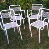 Set of 4 stackable perforated garden armchairs