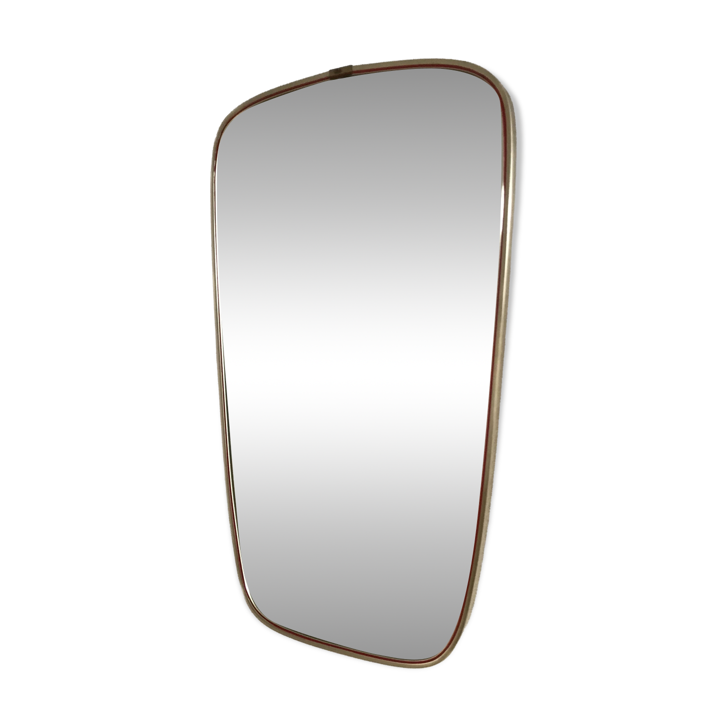 Vintage 1960s mirror in a freeform shape with a gold and red trim.