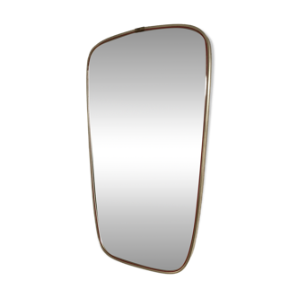 Vintage 1960s mirror in a freeform shape with a gold and red trim.