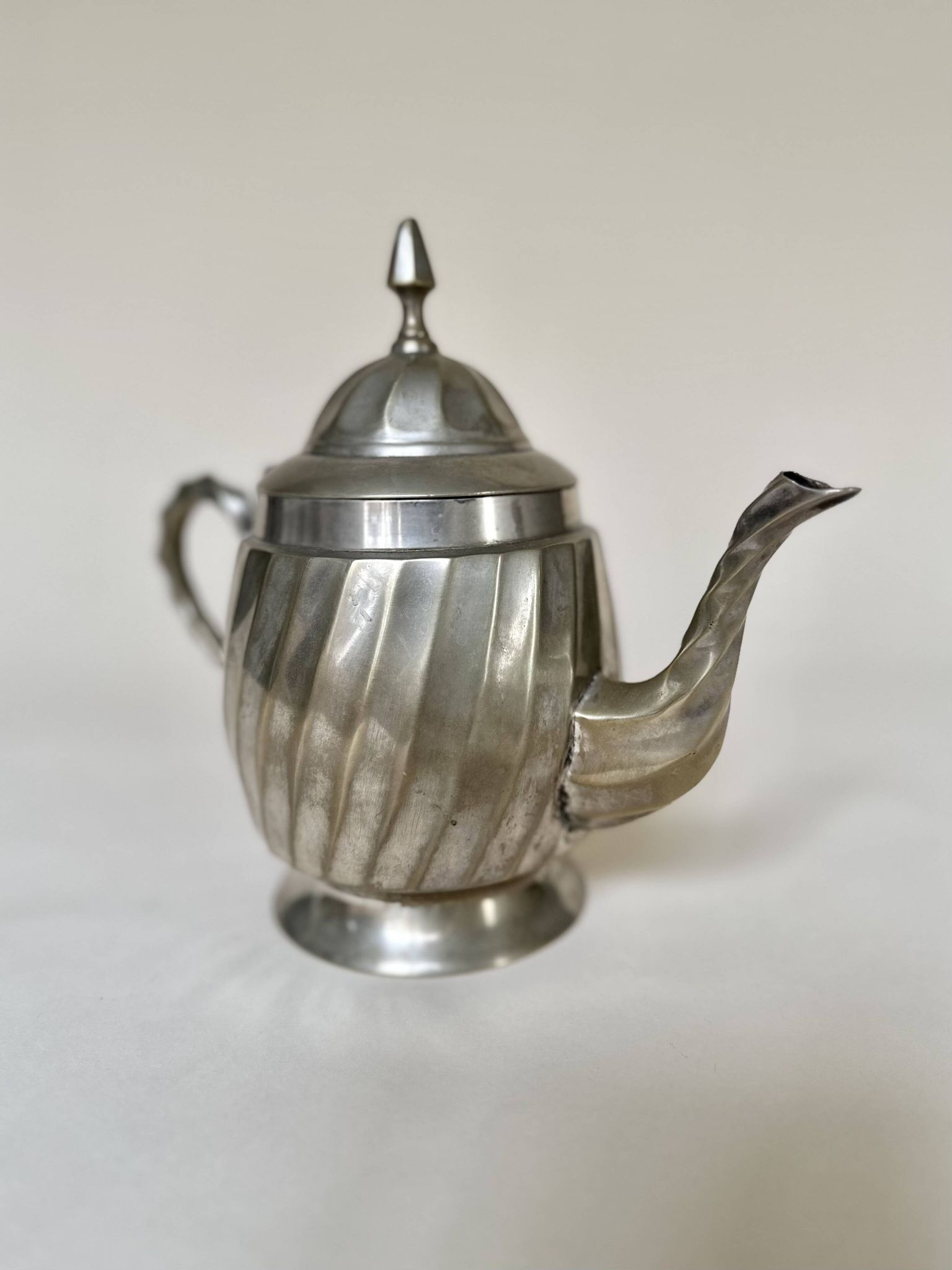 Silver-plated metal teapot with fluted body in Art Deco style