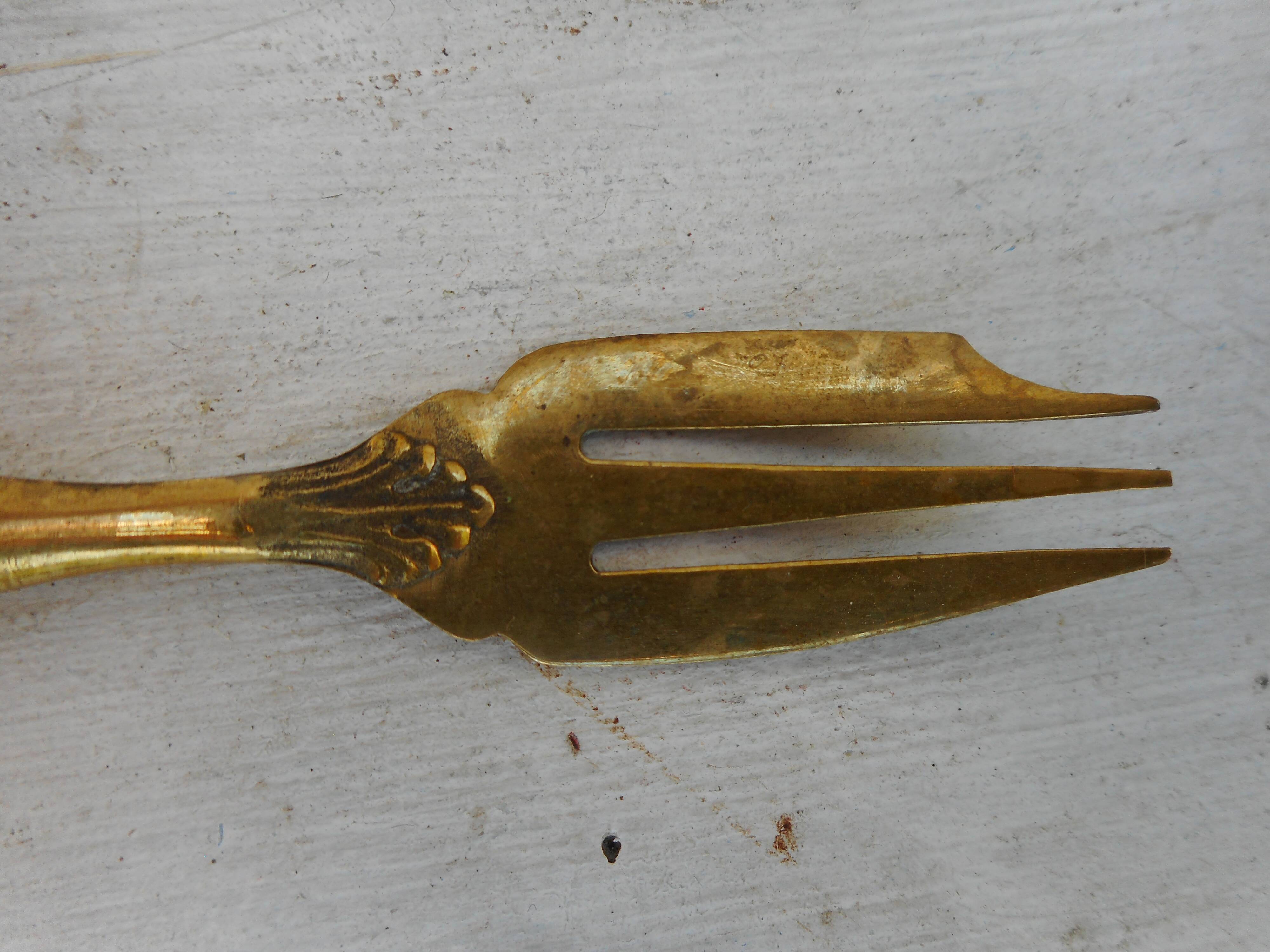 Twelve bakelite handle cake forks