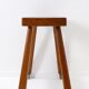 Vintage solid wood side table on casters