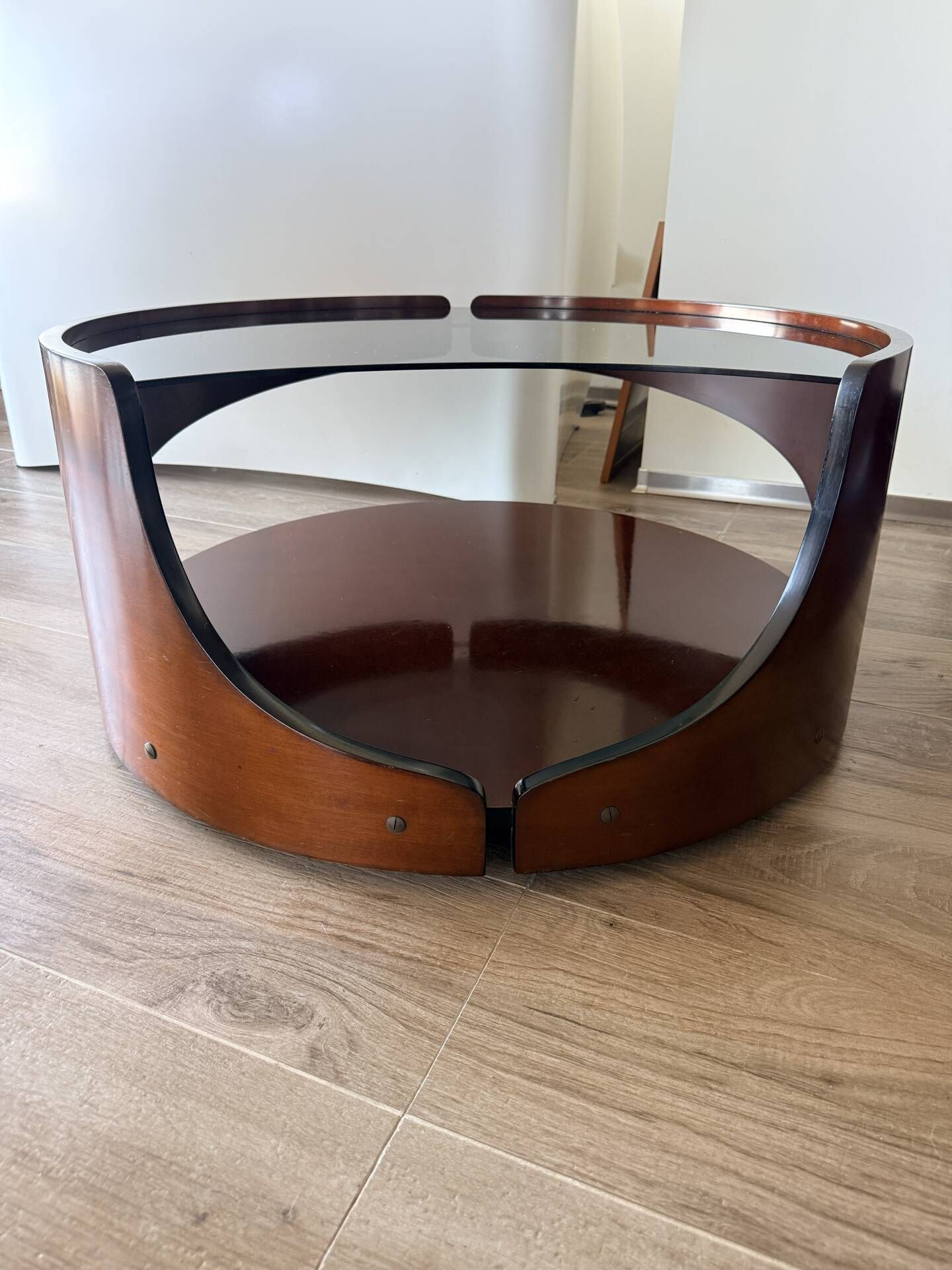 Italian Space Age coffee table in curved wood and smoked glass – 1970s