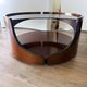 Italian Space Age coffee table in curved wood and smoked glass – 1970s
