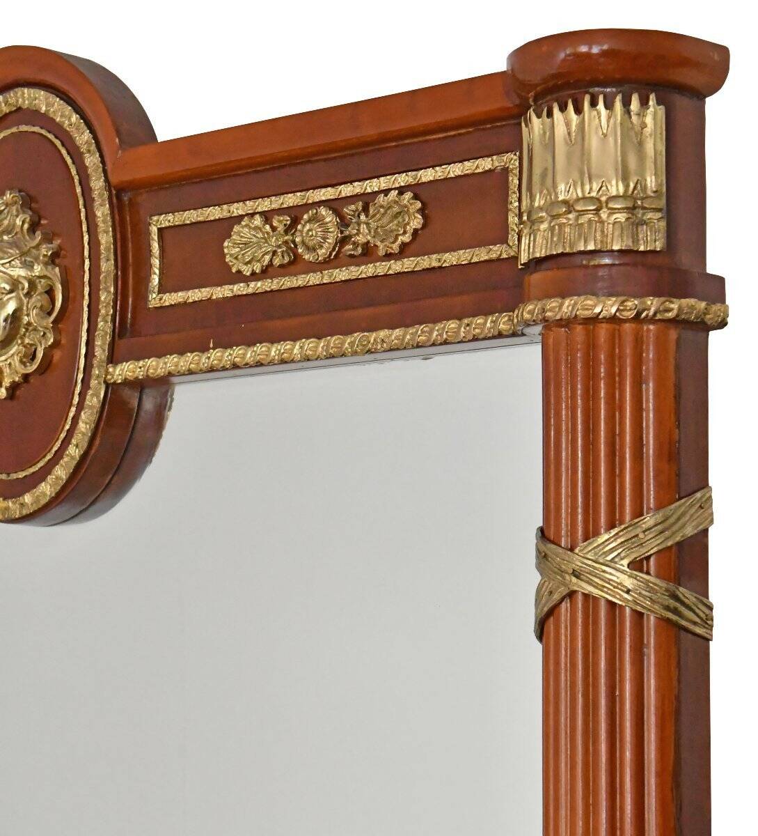Console topped with an Empire-style mirror.