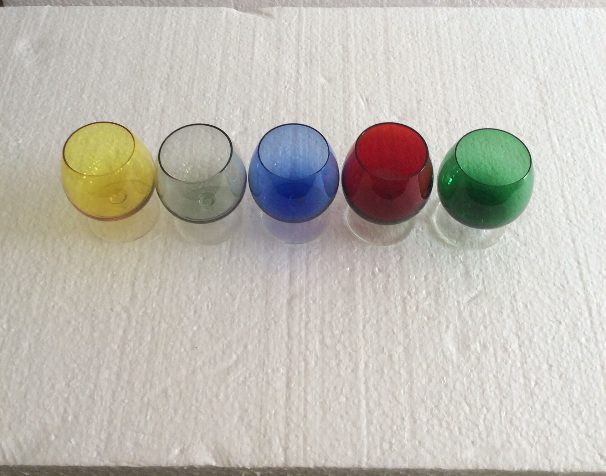 Set of five colorful vintage glasses