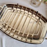 Silver-plated serving dish Quist and its asparagus cradle grid.