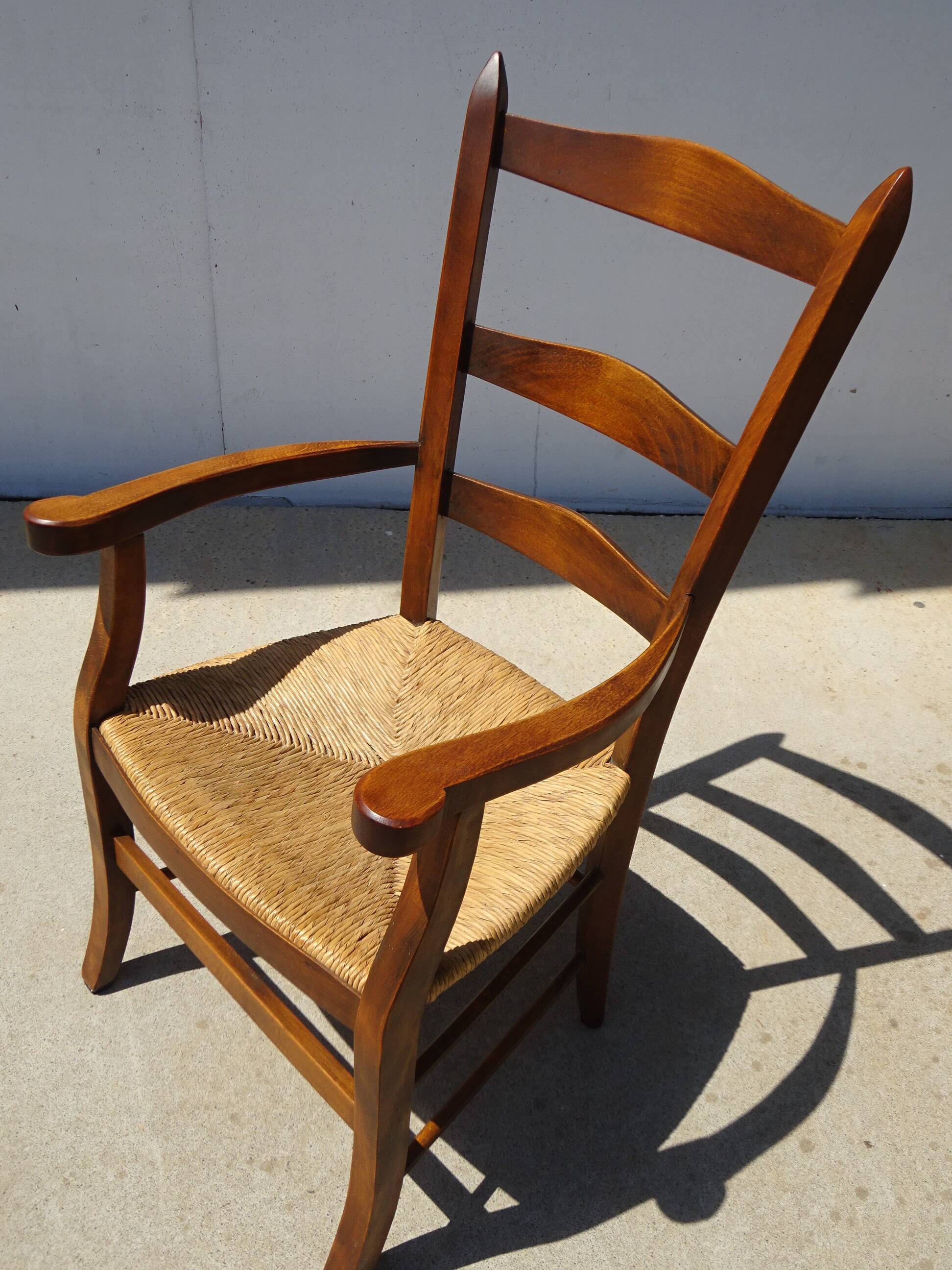 solid wood armchair, straw-covered seat