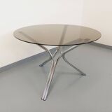Vintage round dining table in smoked glass and chromed metal, Space Age style, from the 70s