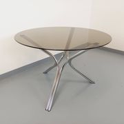 Vintage round dining table in smoked glass and chromed metal, Space Age style, from the 70s