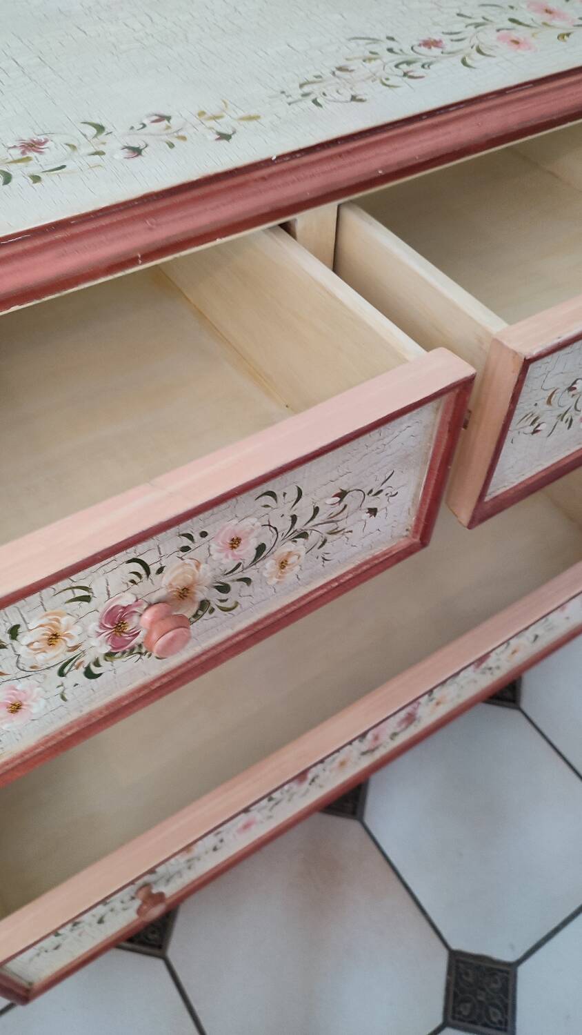 Painted chest of drawers with floral decoration