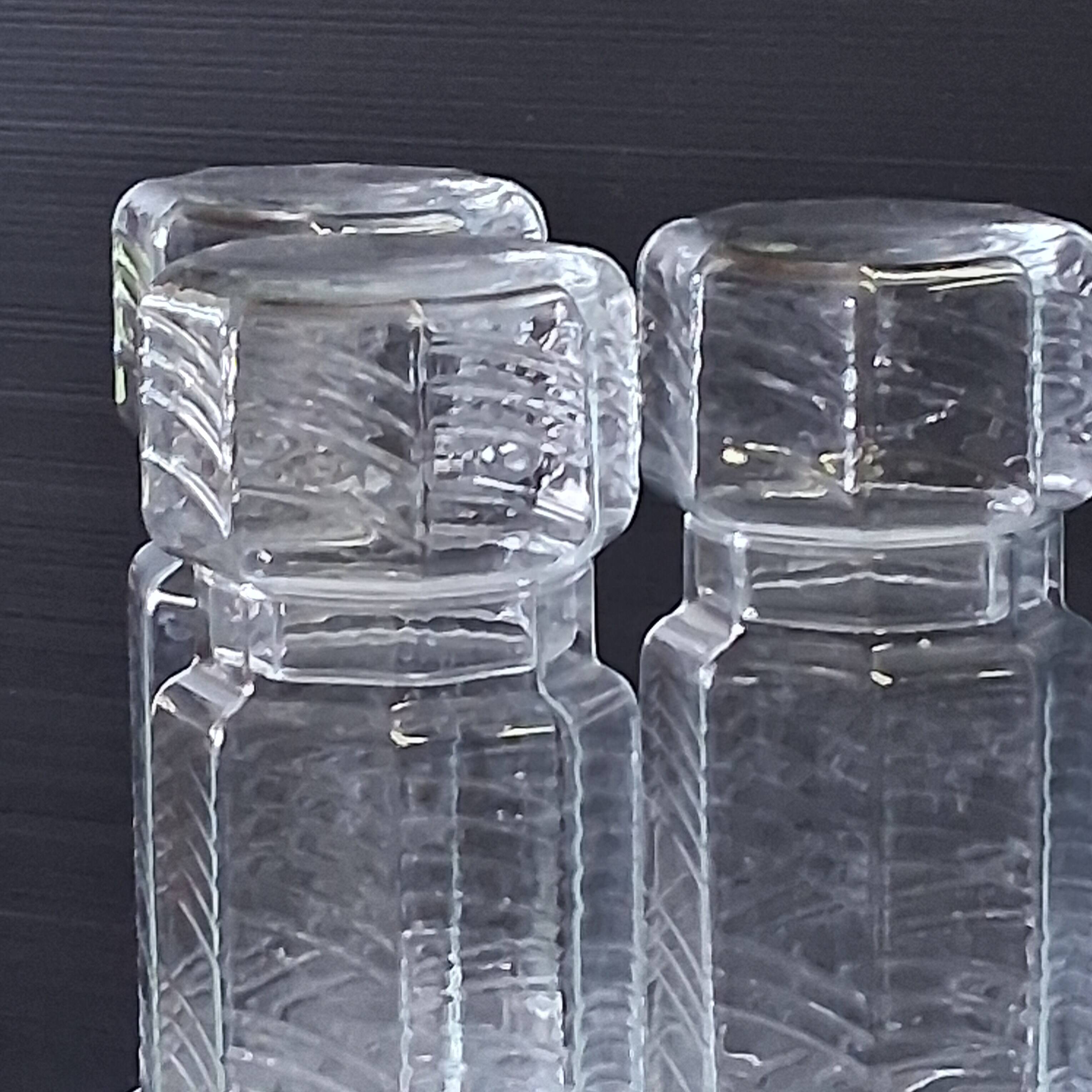 Set of 3 glass jars with old transparent lids in very good condition.