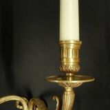 Pair of large Louis XVI style sconces with male faces - bronze