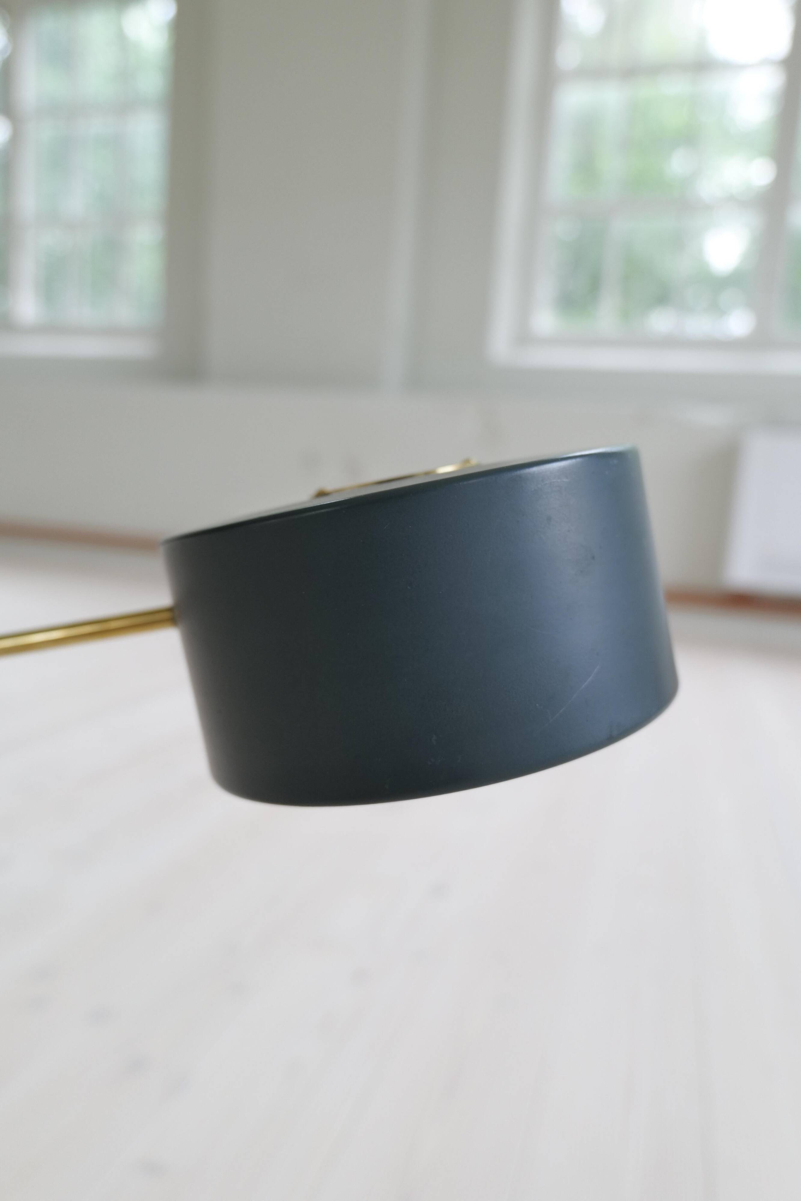 Mid-century modern table lamp in brass and walnut, rare by Einar Bäckström, Sweden.