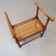Wokkel chair with armrests and webbing seat