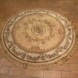 Vintage fringed round rug