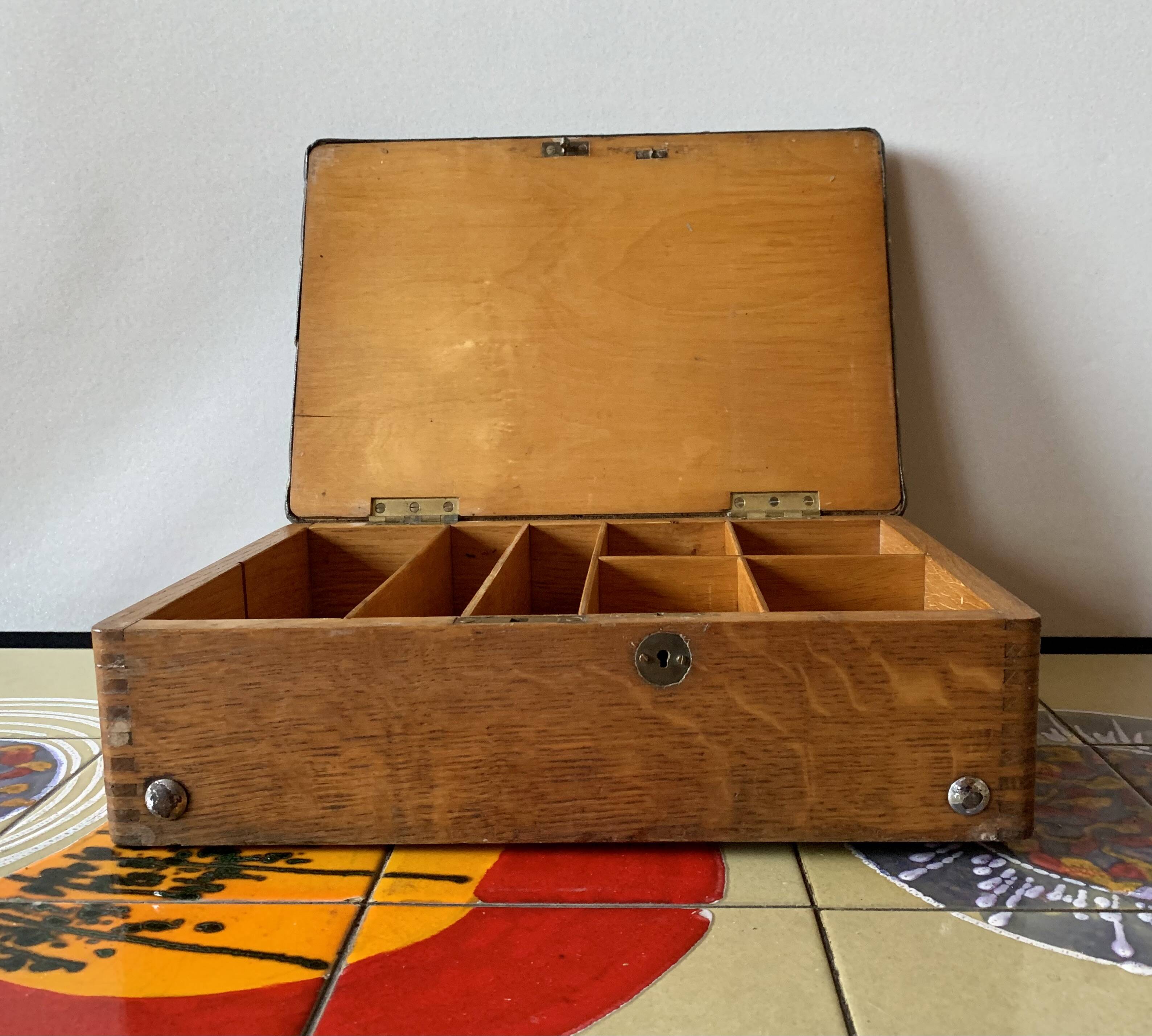Old foldable fisherman's stool in wood and leather