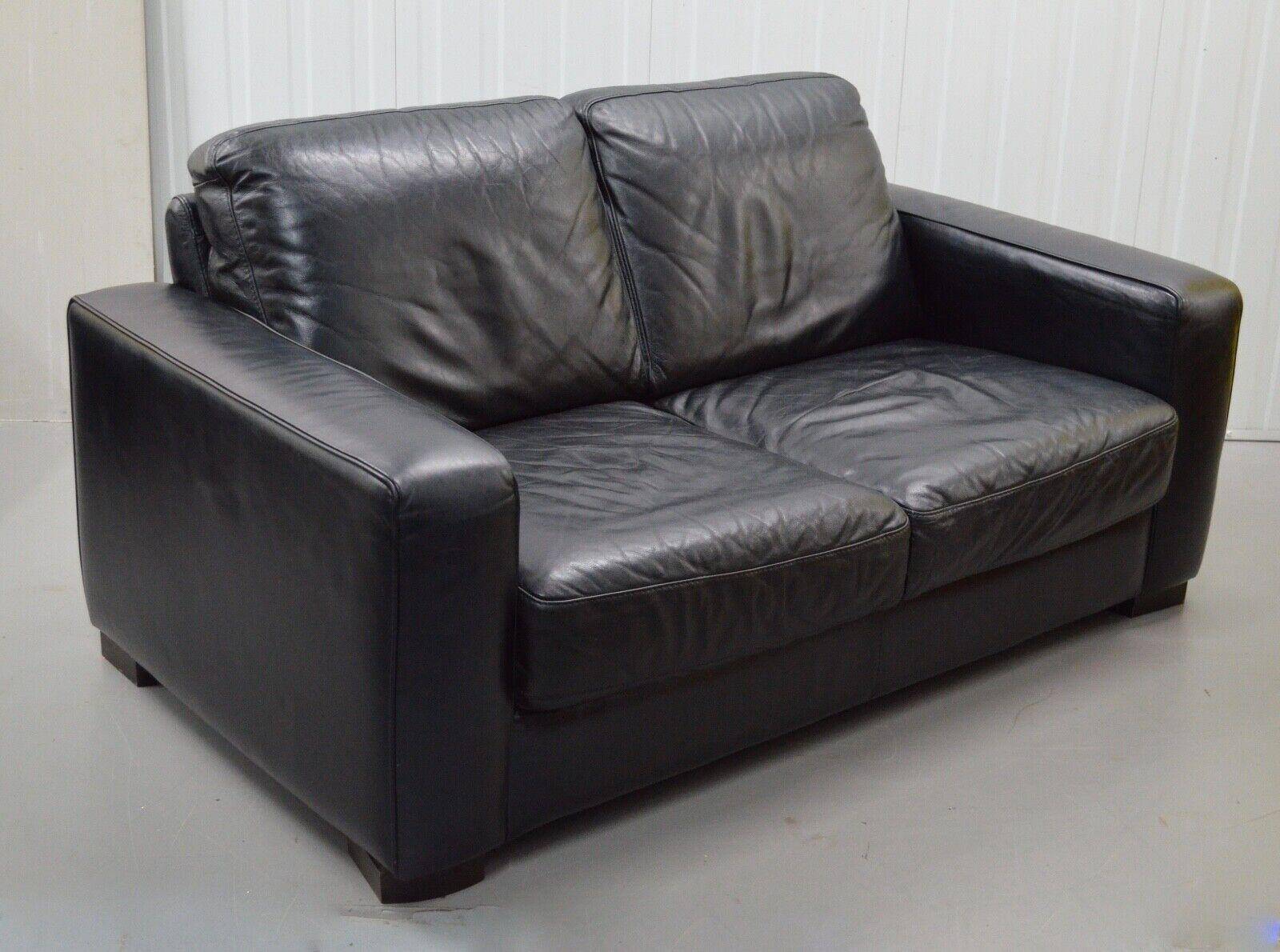 2-seater leather Natuzzi sofa with armchair