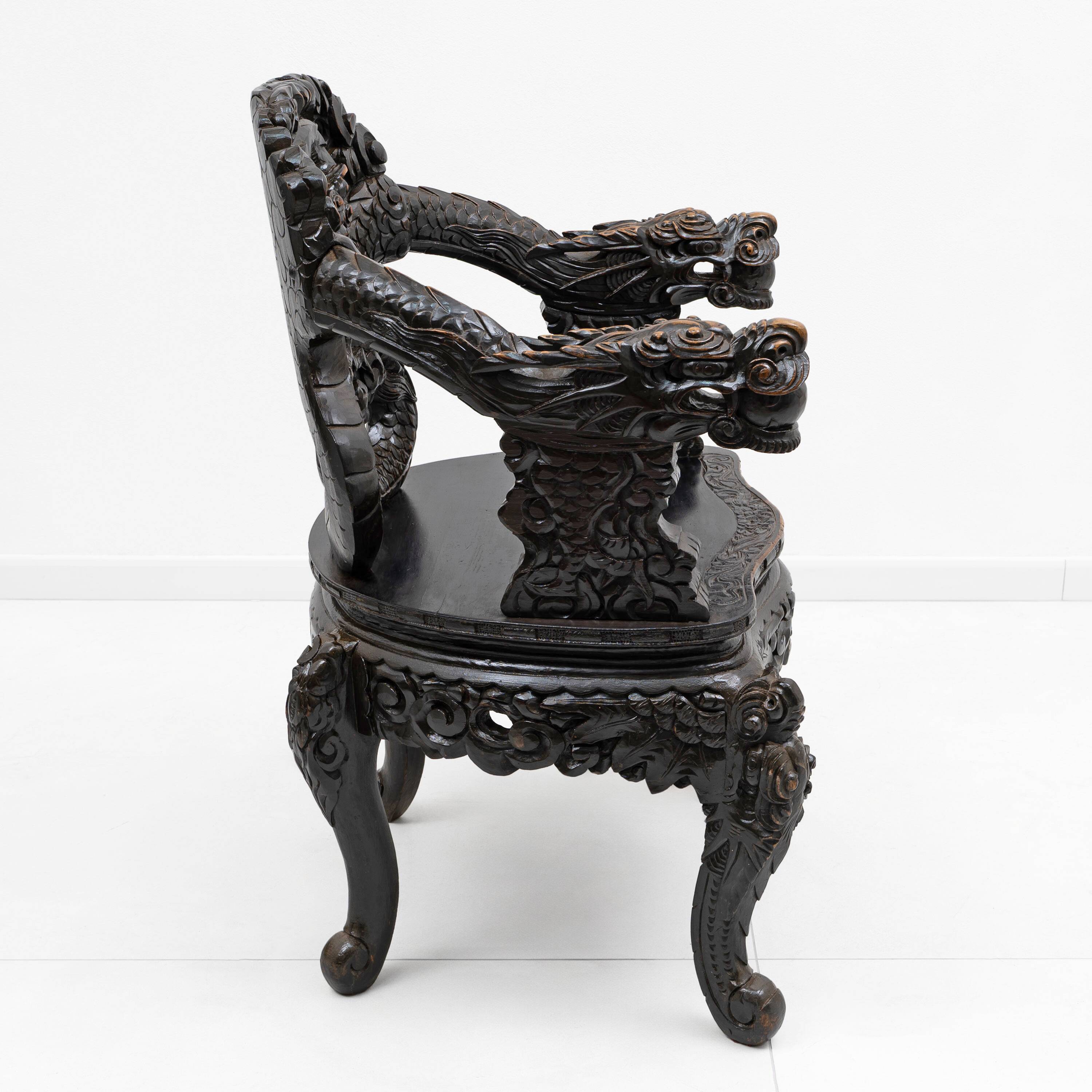 Pair of Chinese Qing Dynasty Carved Dragon Armchairs,Ebonized Hardwood,19th