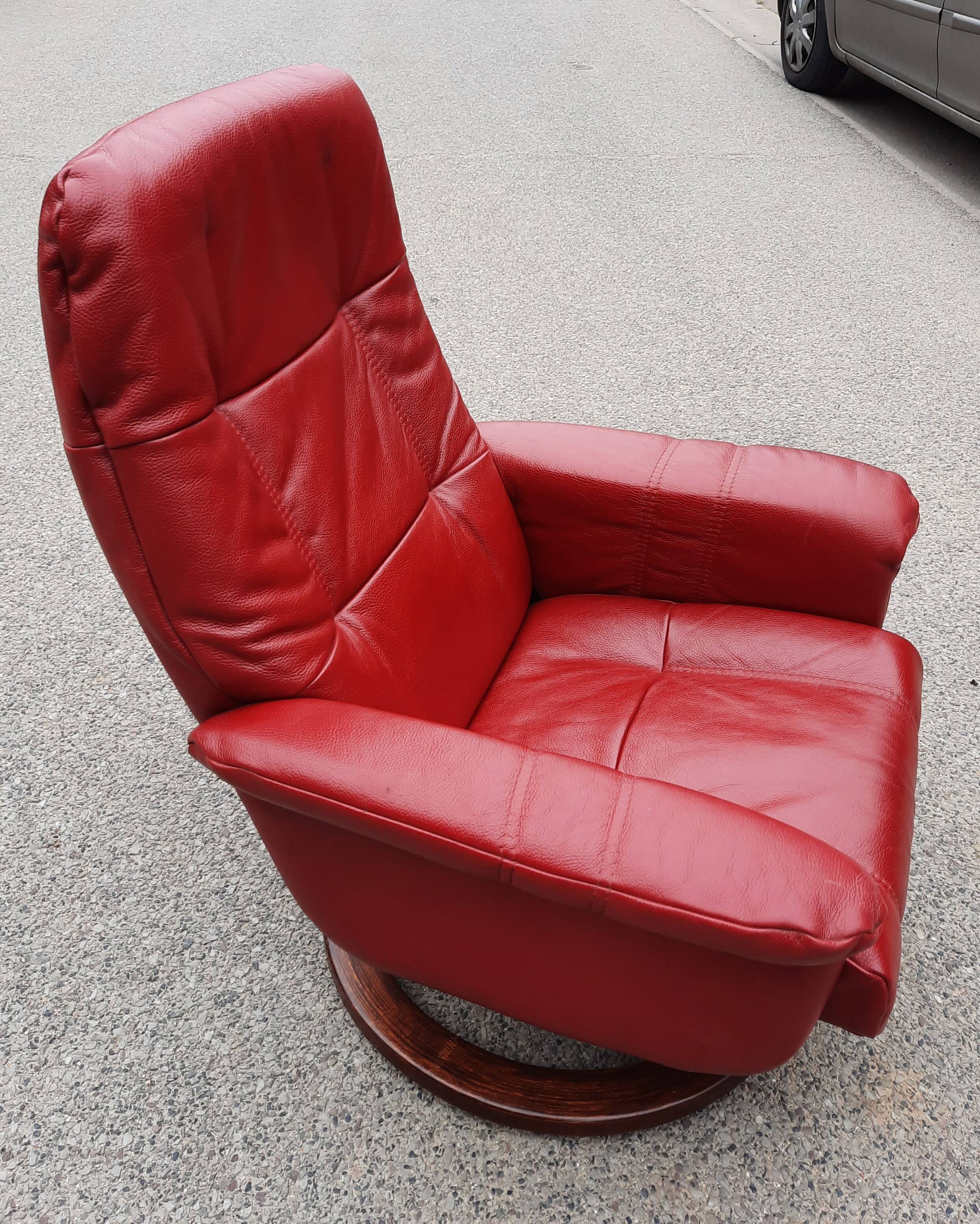 Red leather relax armchair and pouf