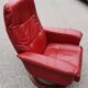 Red leather relax armchair and pouf