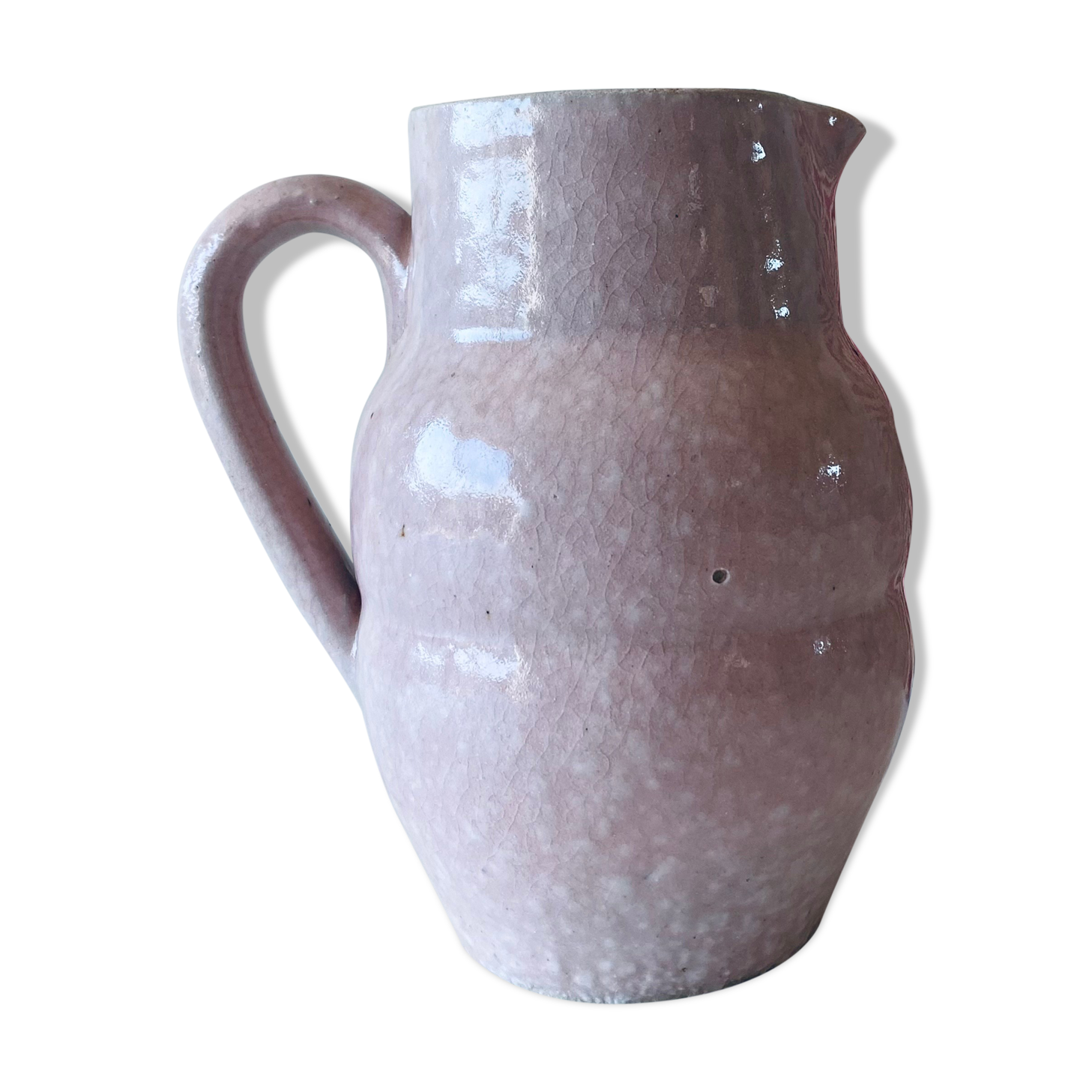 Pitcher in pink glazed ceramic