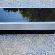 Coffee table in brushed steel and black tinted glass from the 70s