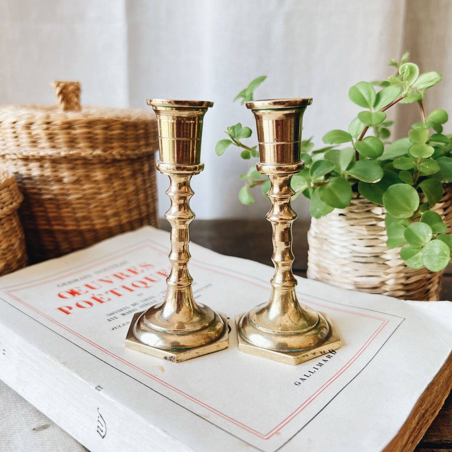 Duo of small brass candle holders