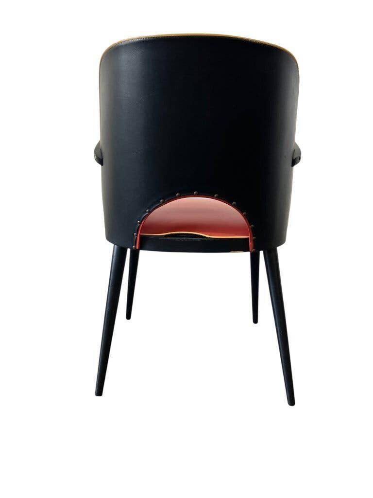 Vintage red rockabilly chair with armrest