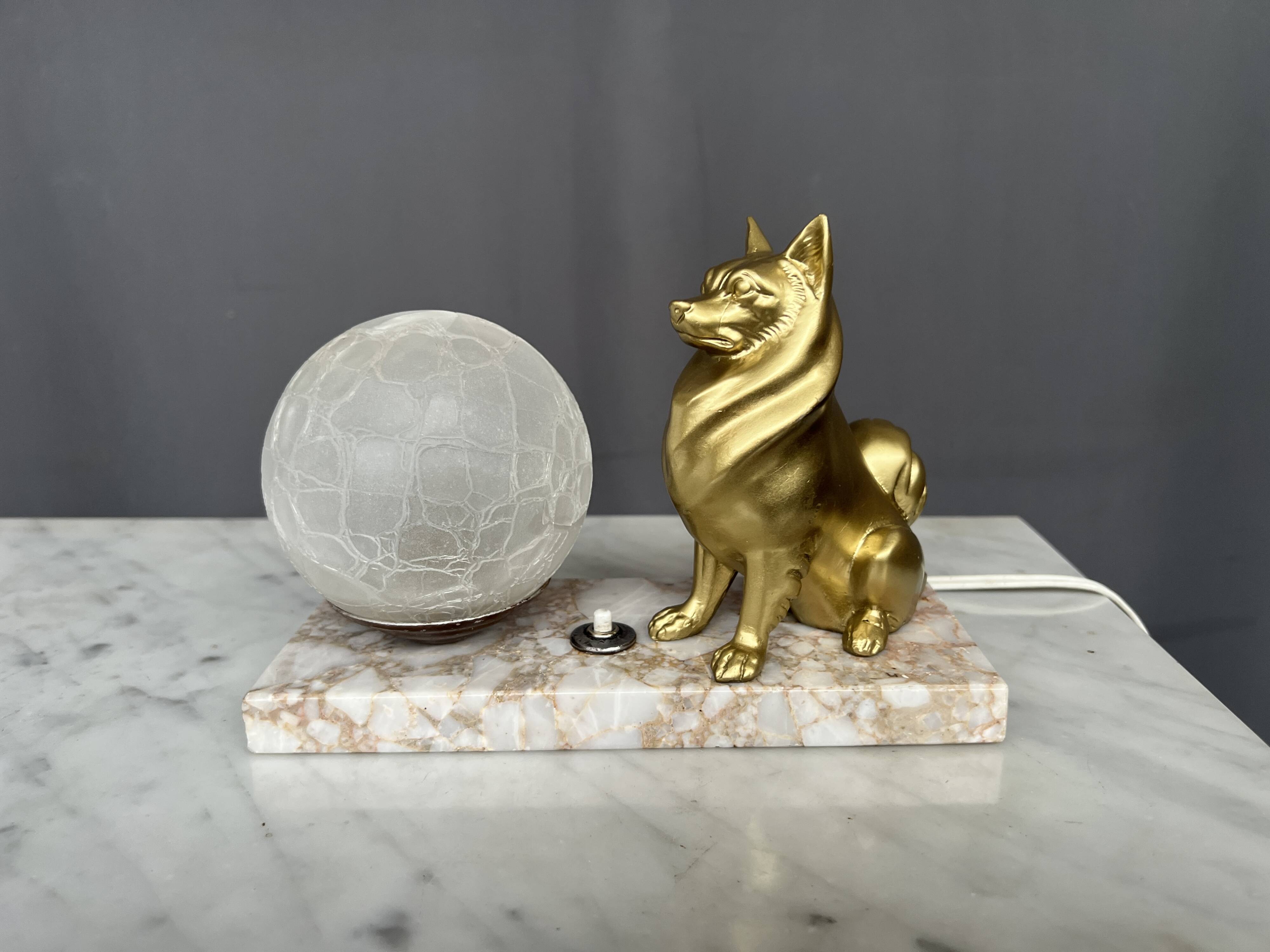 Night lamp with a Spitz figurine in Art Deco style on a marble base.
