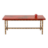 Table basse en laque et fer doré. Années 1950.