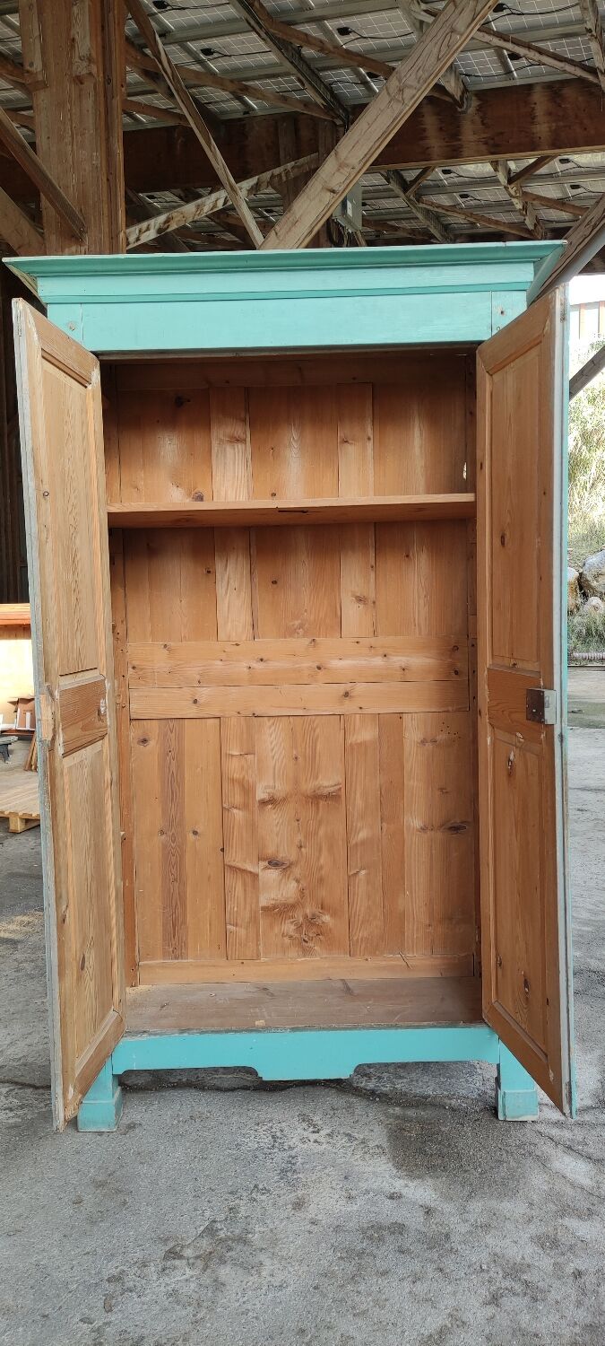 Antique patinated two-door cabinet