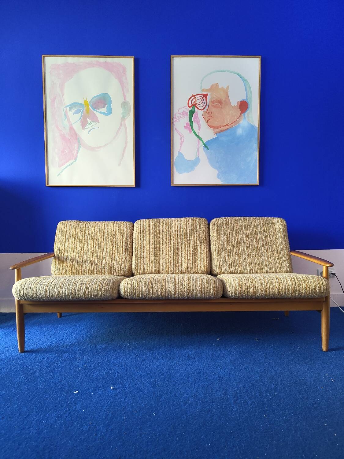 Scandinavian sofa in wood and vintage fabric from the 60s