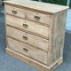 English stripped commode made of solid raw wood from the 19th century.