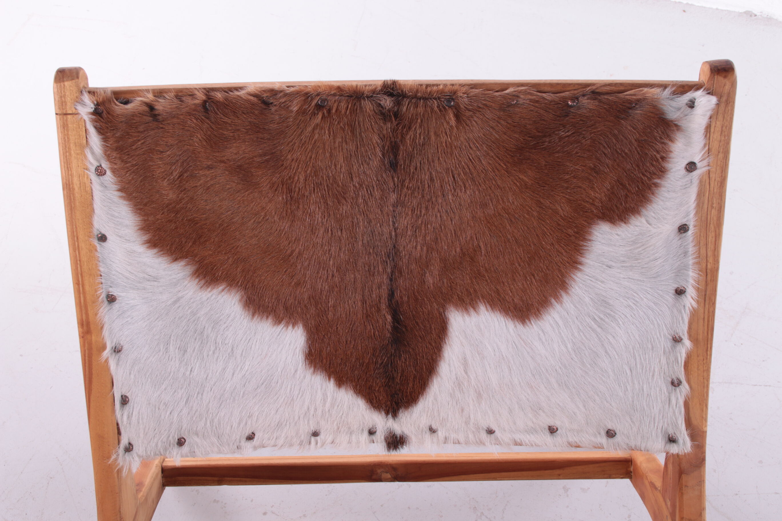 Vintage Relax chair upholstered with cowhide, 1970