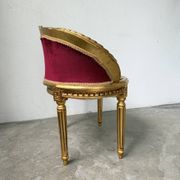 Louis XVI gilt wood and red velvet armchair