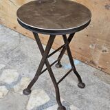 Old industrial folding steel stool