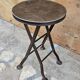 Old industrial folding steel stool